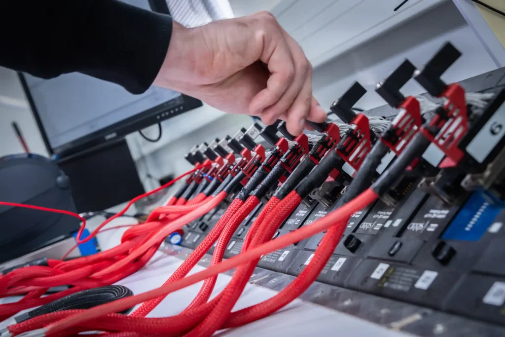 Cable assembly being verified on a Cirris tester